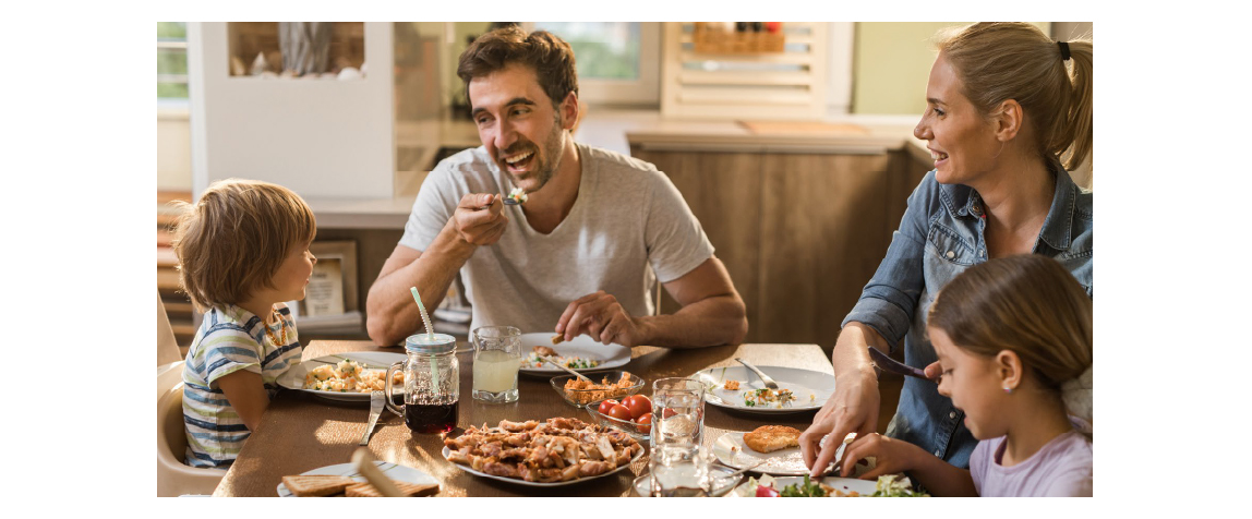 Happy Family having a meal together